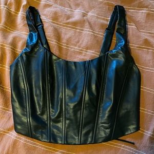 Black tank top with tie back and zipper on side